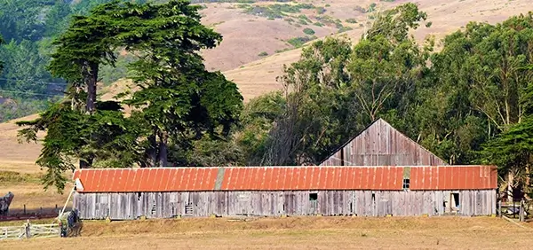 Photo of old barn with dry hillsides to represent the California North Bay where BTC has two mental health clinics